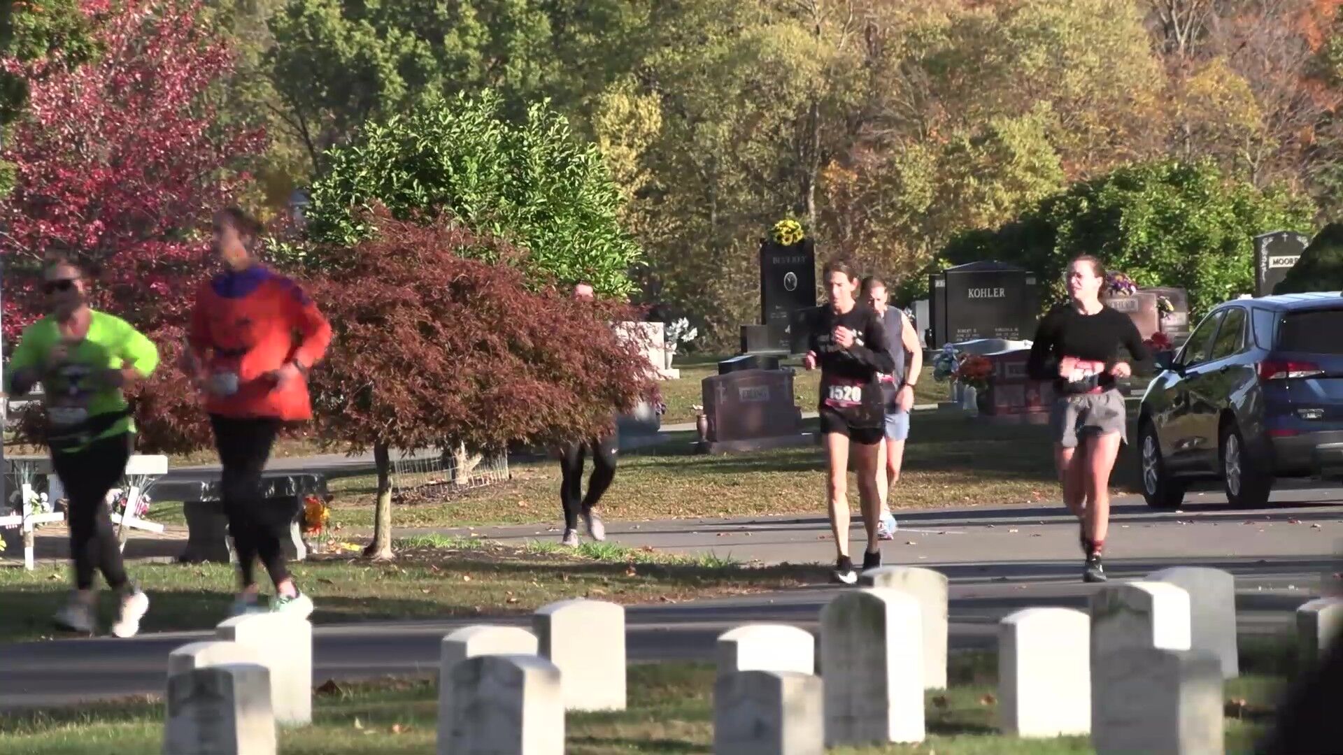 Runners race through Woodlawn Cemetery for Kiwanis Club’s Howl’oween Trick or Trot